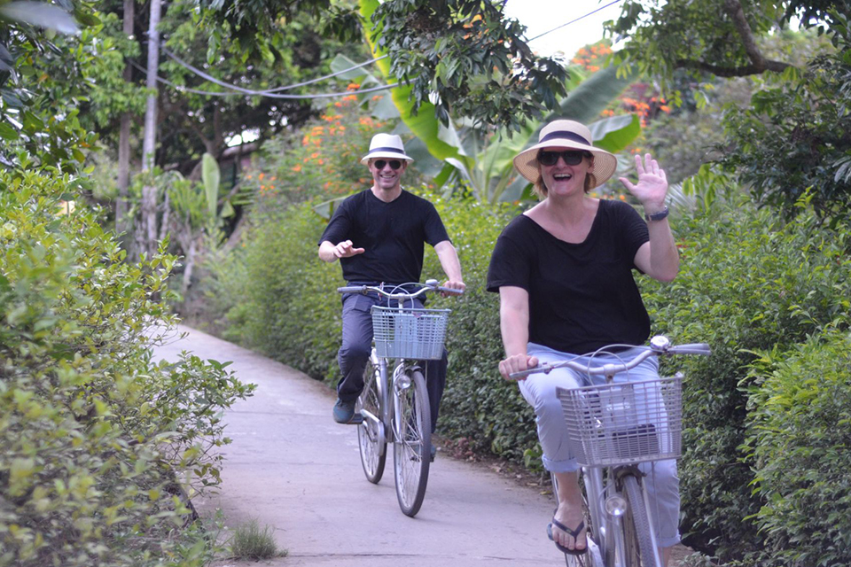 biking-around-village-cai-be-floating-market-tan-phong-island-full-day-group-tour-1